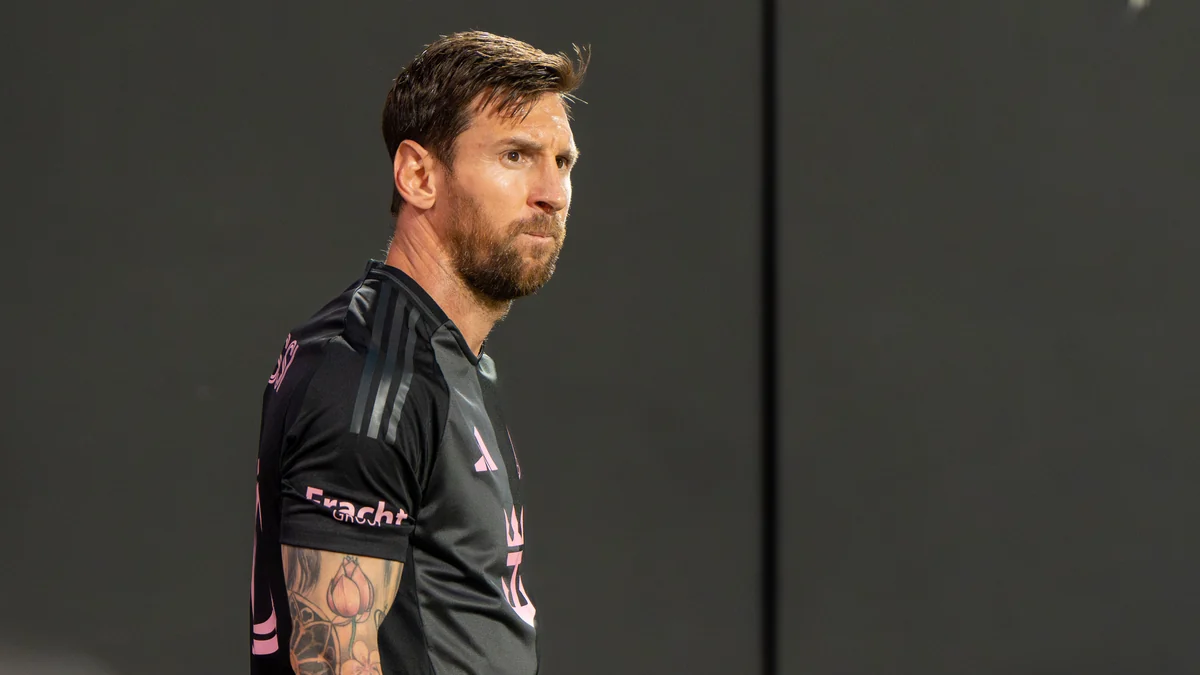 Lionel Messi in profile wearing Inter Miami’s black shirt