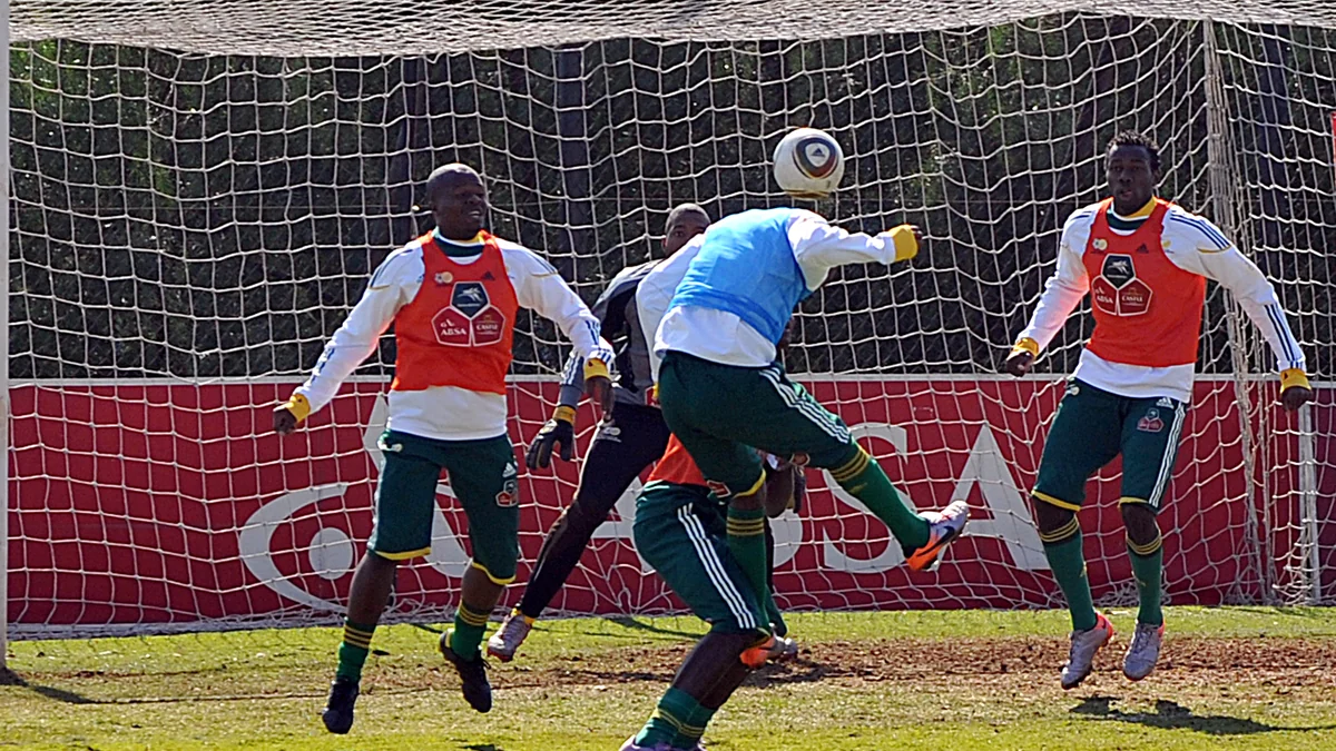 South Africa players challenge for an aerial ball in front of goal during training