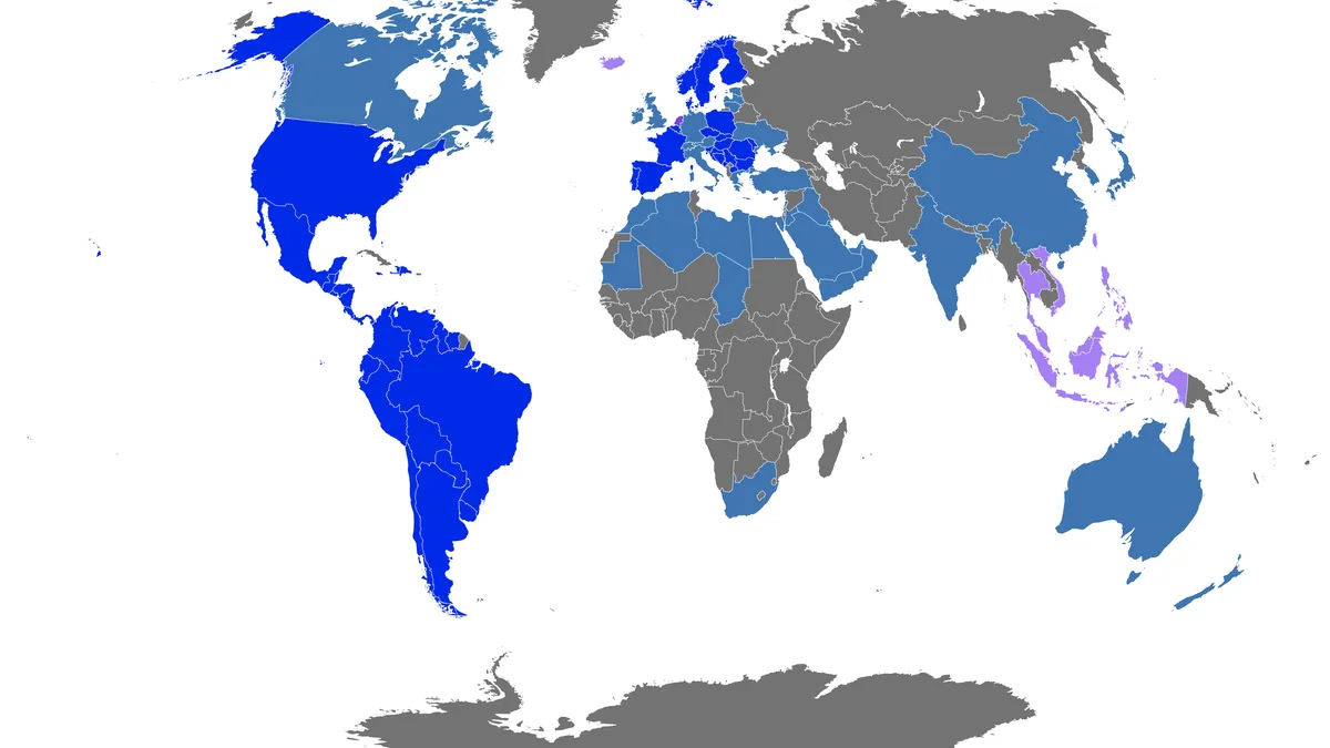 Carte du monde avec des pays en bleu et violet et d’autres en gris