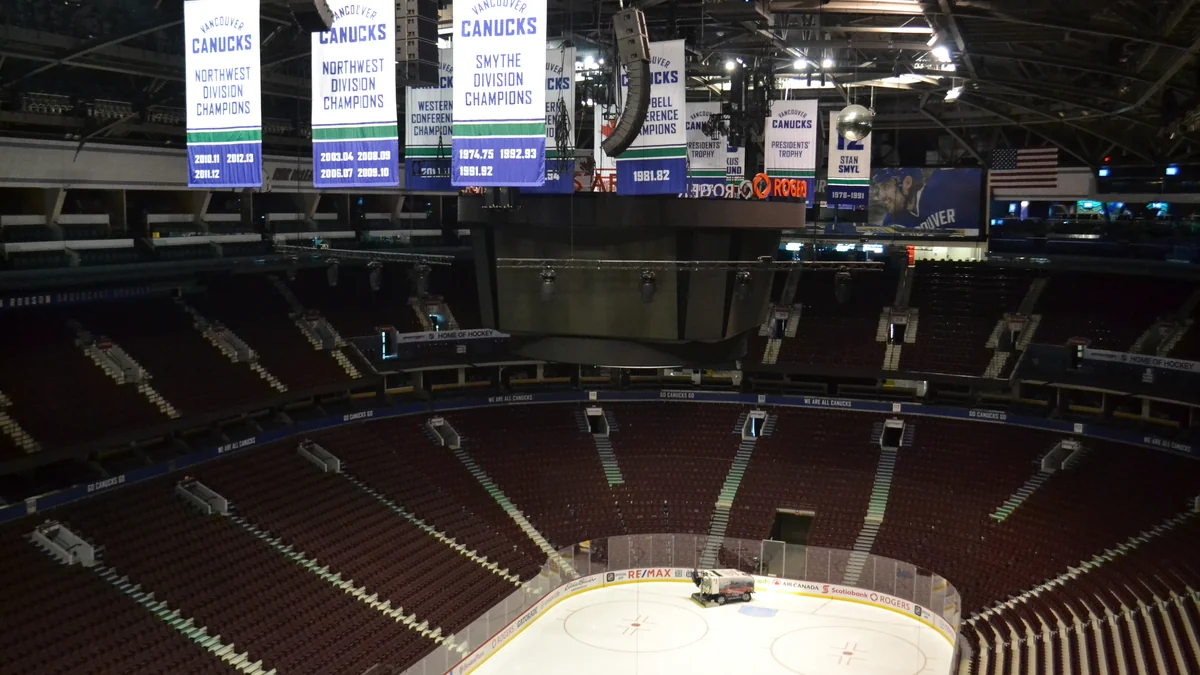 Seating, suspended scoreboard and part of the ice rink at Rogers Arena
