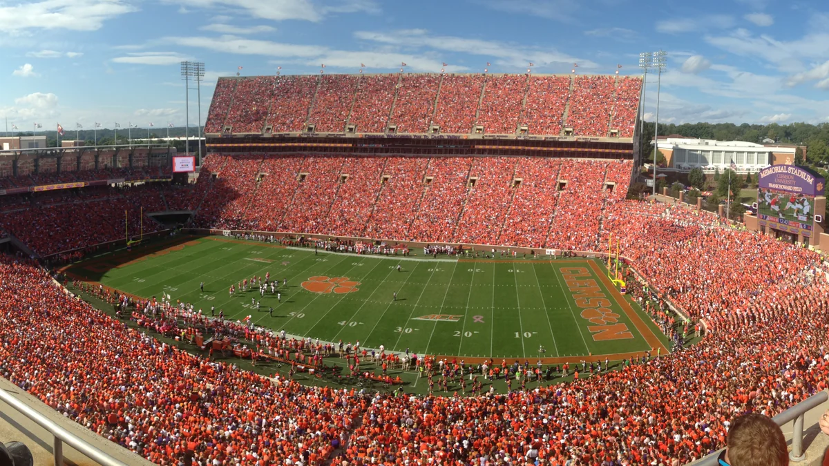 Panoramic view of a packed Memorial Stadium, with the football field and Clemson fans in the stands