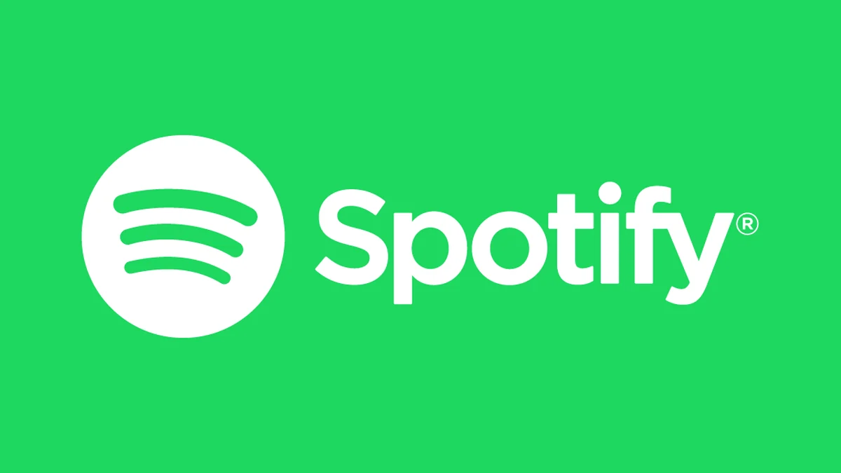 White Spotify logo on a green background.