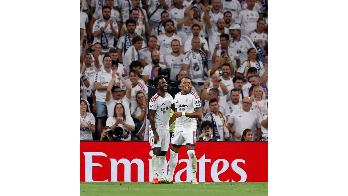 Kylian Mbappé and Vini Jr. celebrate together during Real Madrid versus Real Sociedad.