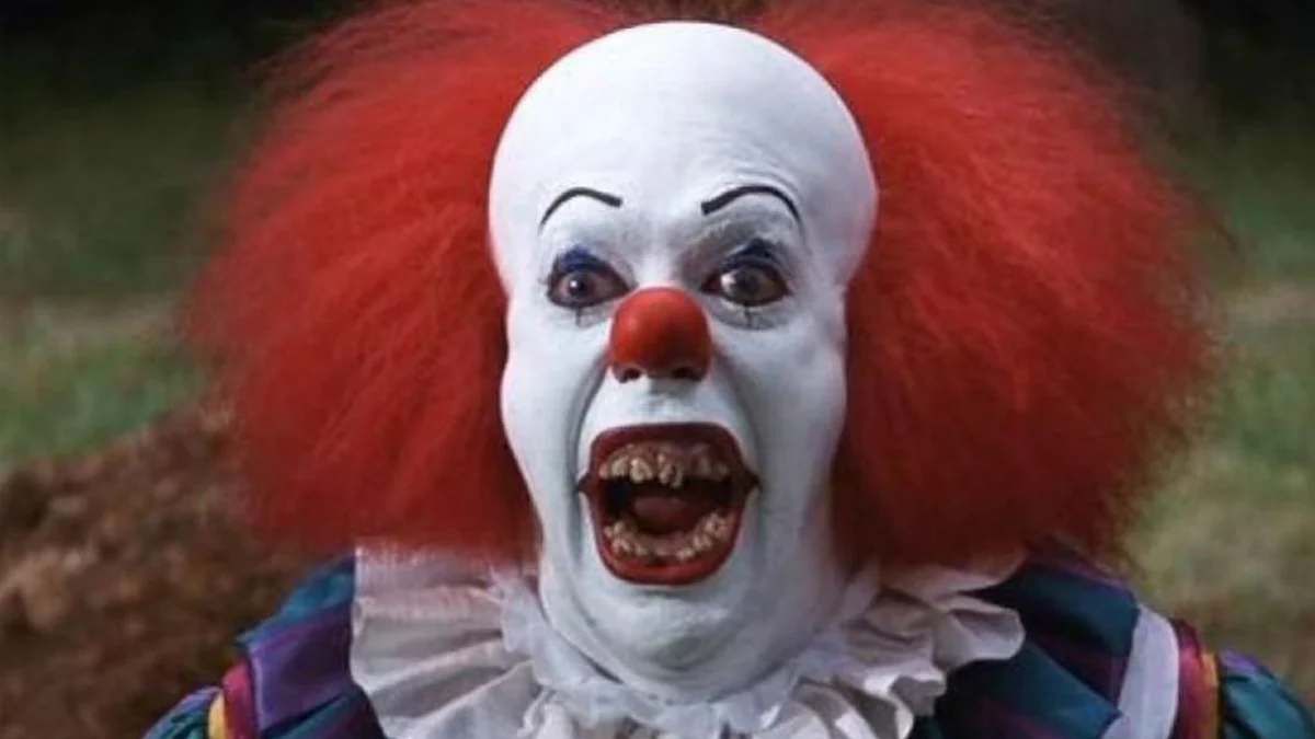 Tim Curry as Pennywise in the television adaptation of Stephen King’s It.